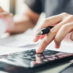 business owner calculating weighted average