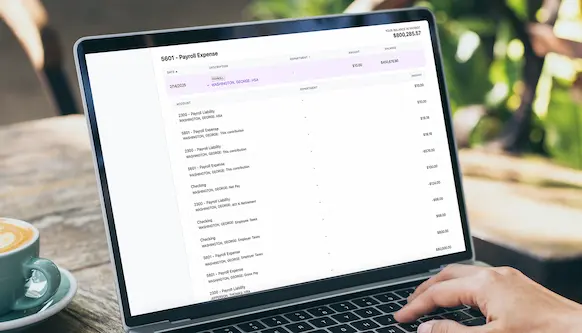 Person using Patriot Accounting General Ledger on laptop