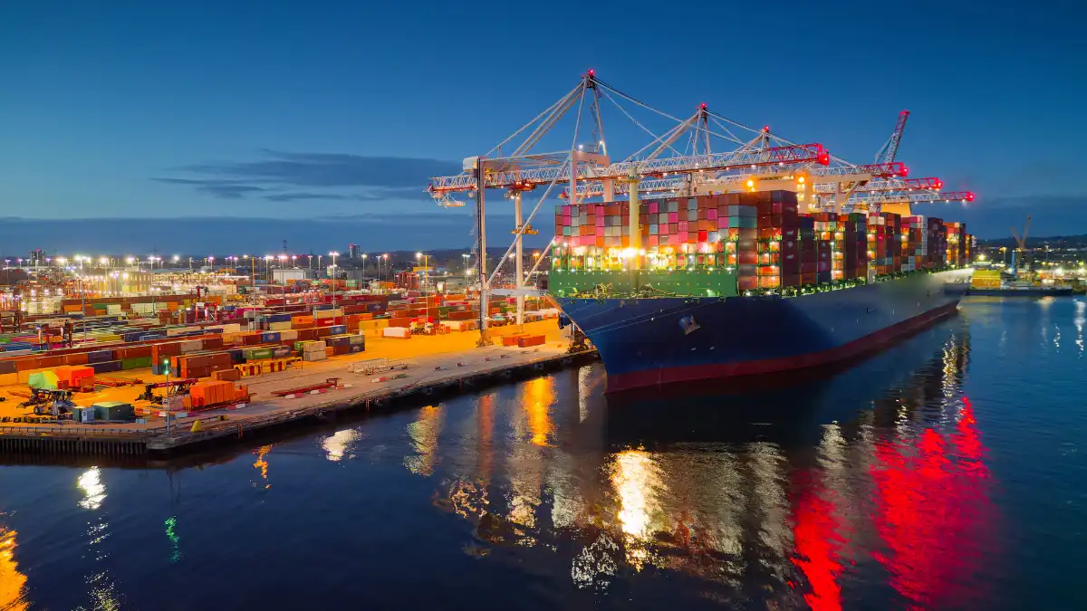 Boat carrying shipment of goods for import.
