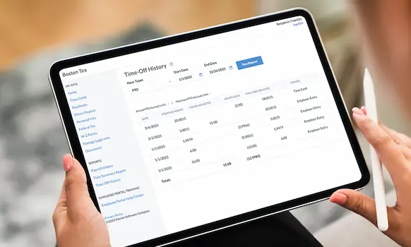 Person using tablet to check PTO balances