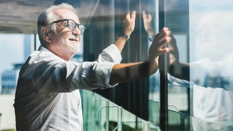 Man thinking about in-house payroll vs. outsourcing.