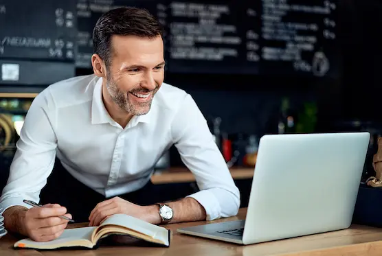 Restaurant owner running payroll