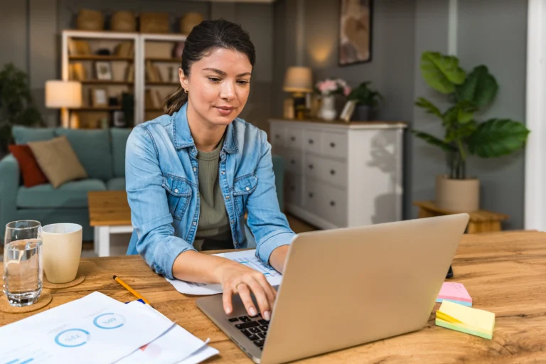 woman at computer creating IRS ready chart of accounts