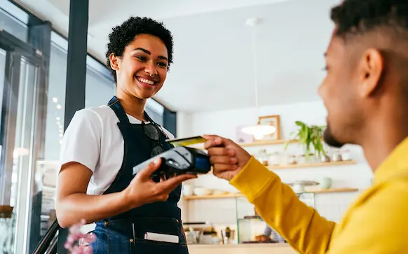 Colorado business owner taking care of customer