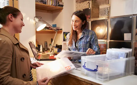 Illinois business owner taking care of customer