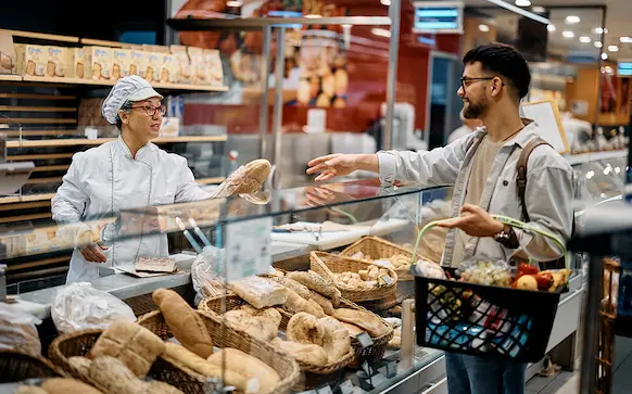 Massachusetts business owner taking care of customer