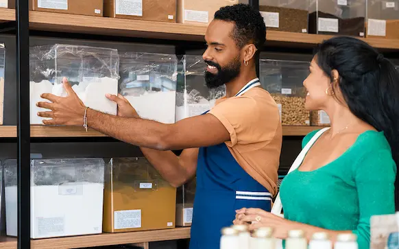 Minnesota business owner taking care of customer