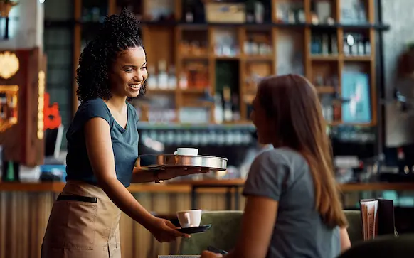 North Carolina business owner taking care of customer