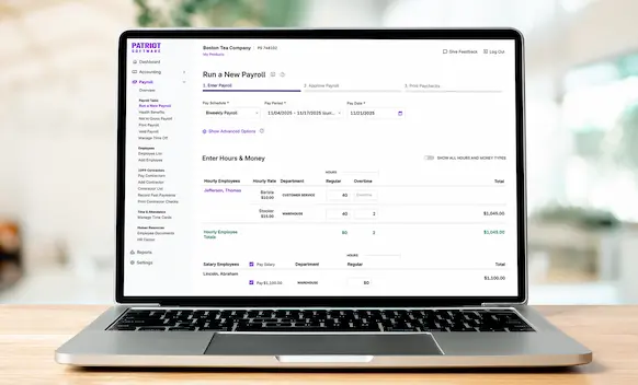 Laptop being used to run payroll.