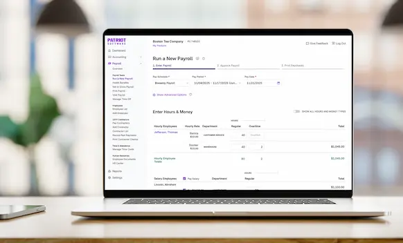 Laptop being used to run payroll.