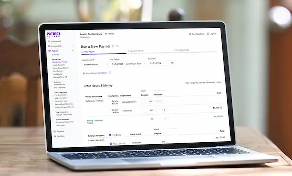 Laptop being used to run payroll.