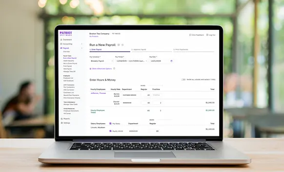 Laptop being used to run payroll.
