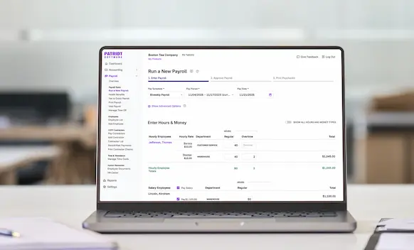 Laptop being used to run payroll.