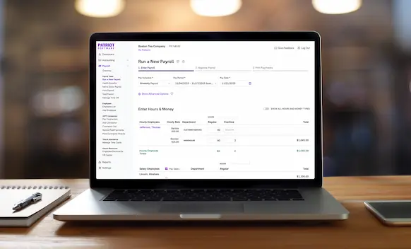 Laptop being used to run payroll.