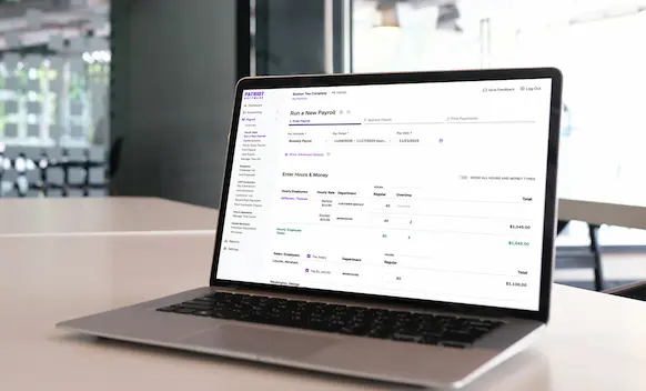 Laptop being used to run payroll.