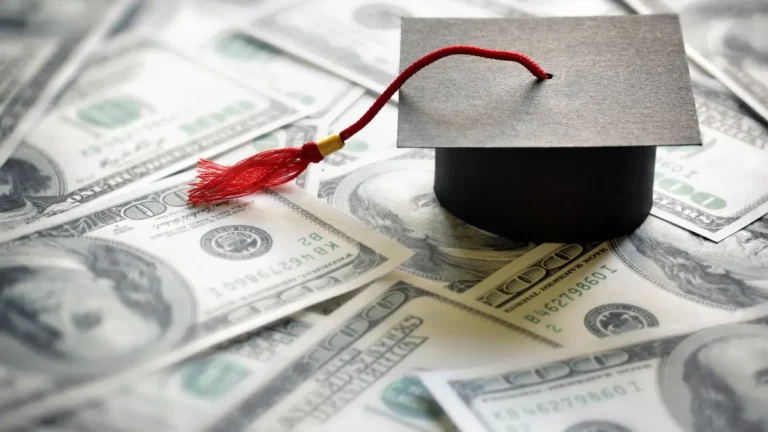 Grad cap on $100 bills, representing student loan garnishment.