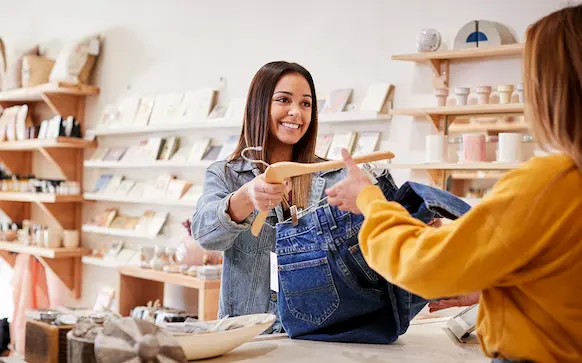 Oregon business owner serving customer
