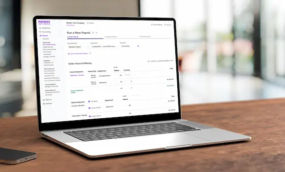 Laptop being used to run payroll.
