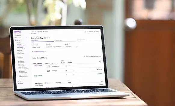 Laptop being used to run payroll.