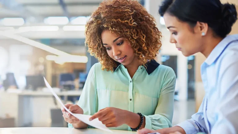 Employer and employee viewing payroll deadlines.