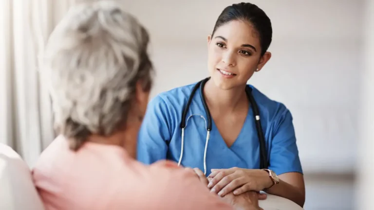 Nurse talking with a patient.