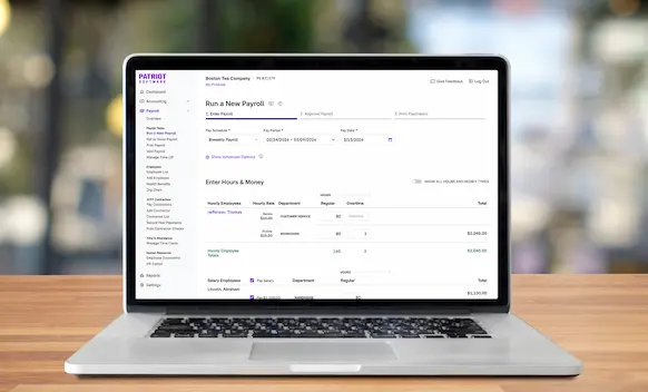 Laptop being used to run payroll.