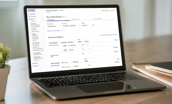 Laptop being used to run payroll.