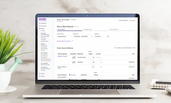Laptop being used to run payroll.
