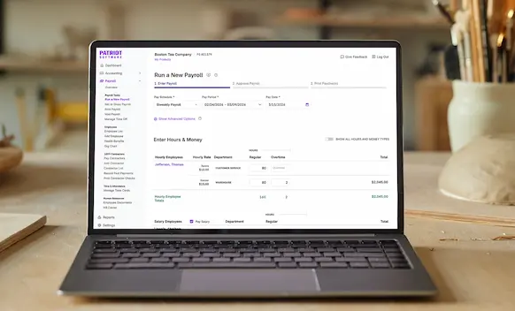 Laptop being used to run payroll.