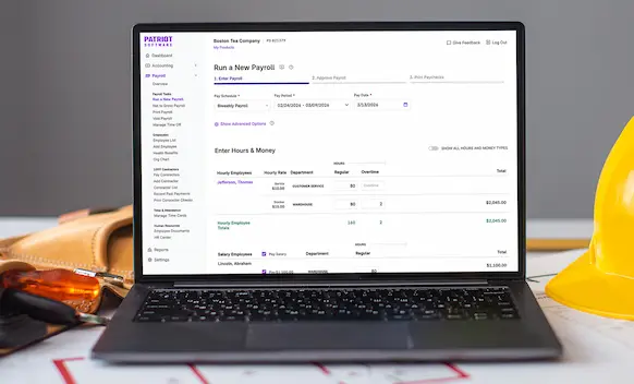 Laptop being used to run payroll.