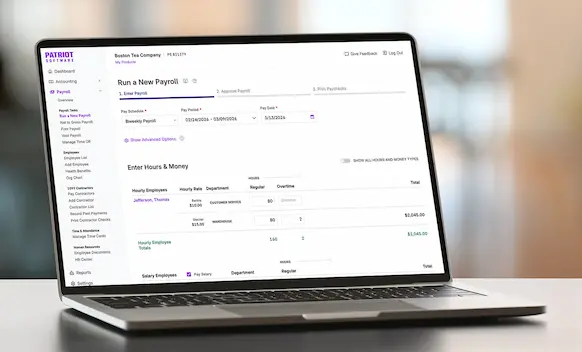 Laptop being used to run payroll.