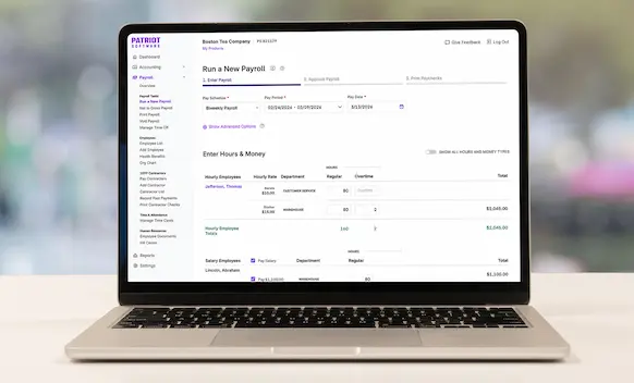 Laptop being used to run payroll.