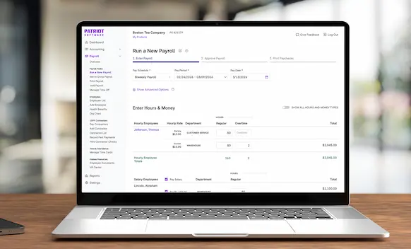Laptop being used to run payroll.