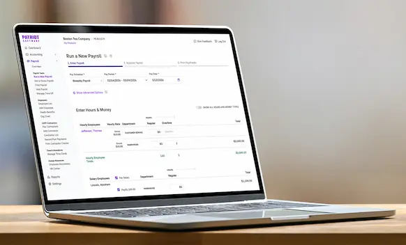 Laptop being used to run payroll.