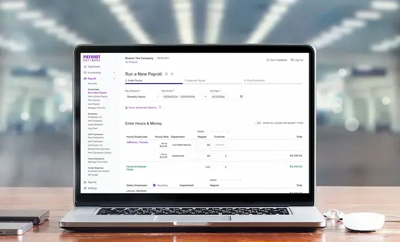 Laptop being used to run payroll.