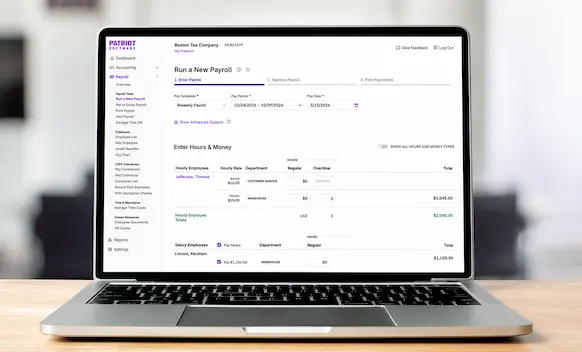 Laptop being used to run payroll.
