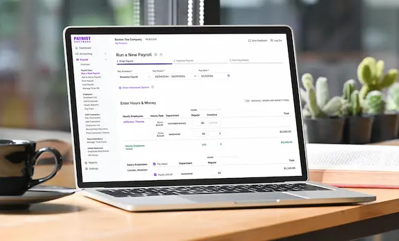 Laptop being used to run payroll.