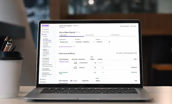 Laptop being used to run payroll.