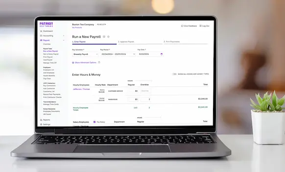 Laptop being used to run payroll.