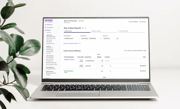 Laptop being used to run payroll.