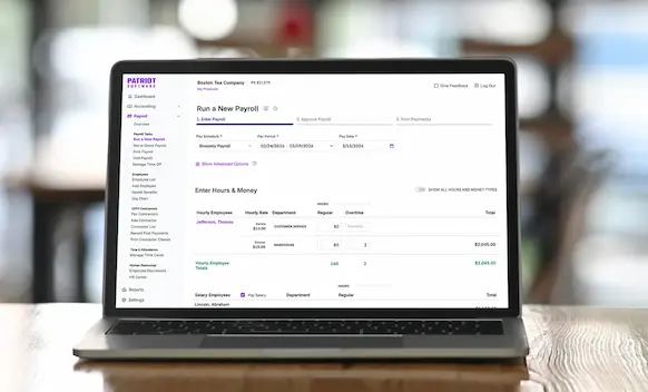 Laptop being used to run payroll.