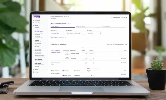 Laptop being used to run payroll.