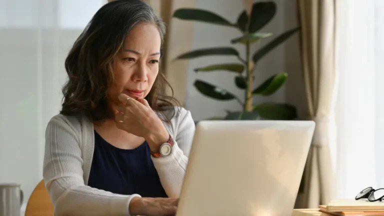 Youth pastor on her laptop.