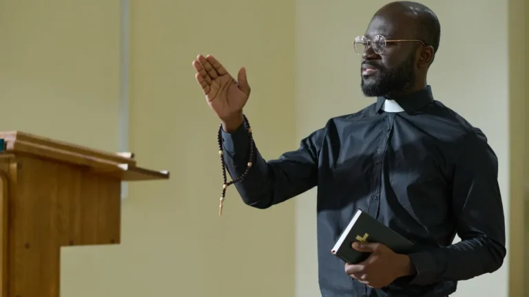 Pastor leading his parish.