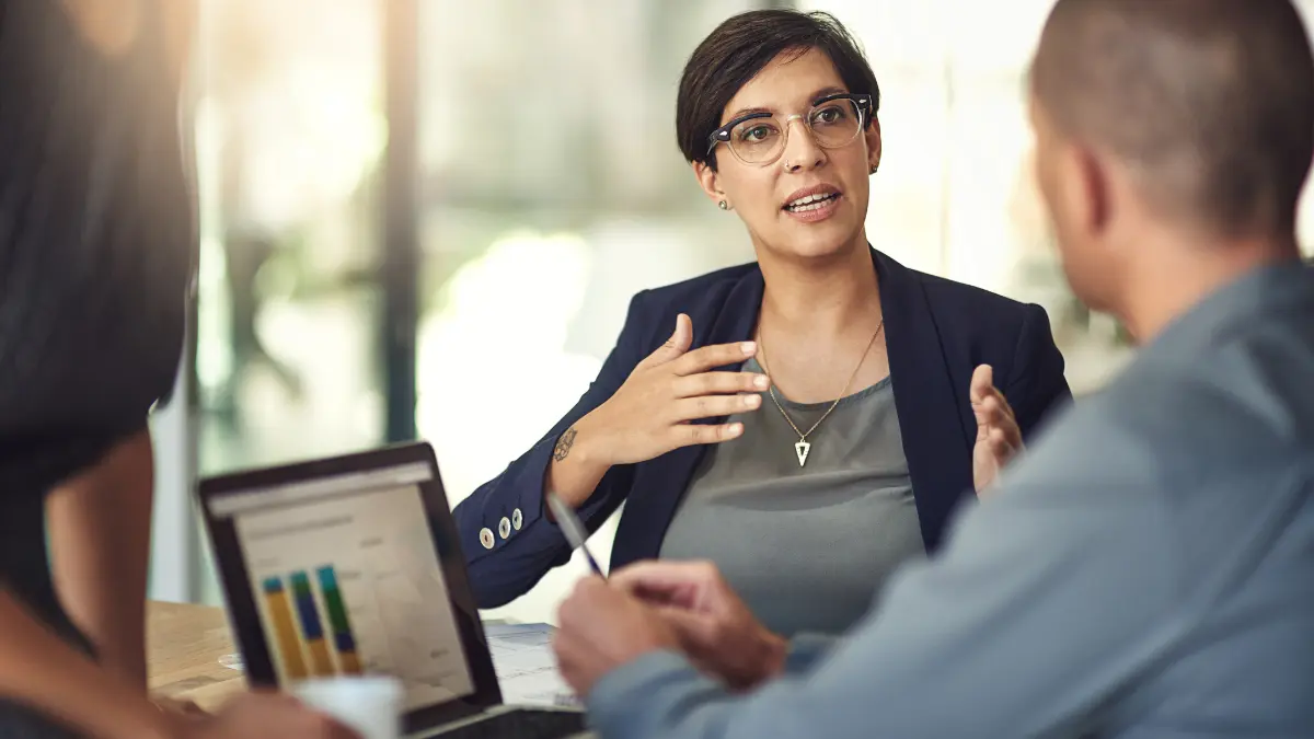 Accountant explaining cost-benefit analysis to business.