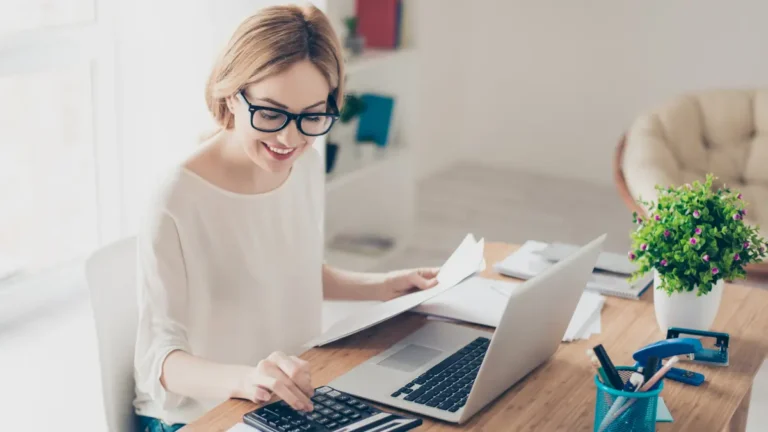 Woman using a calculator.