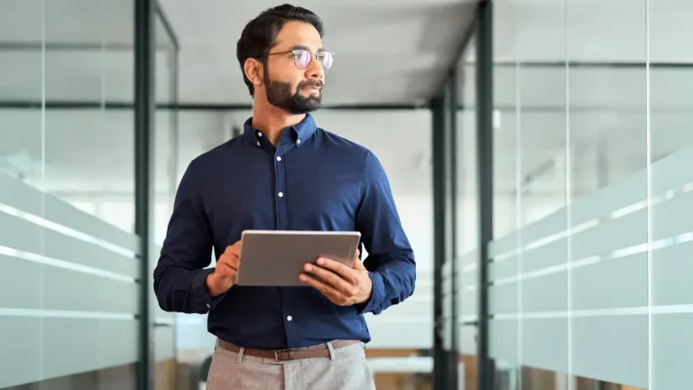 Man walking in an office building.