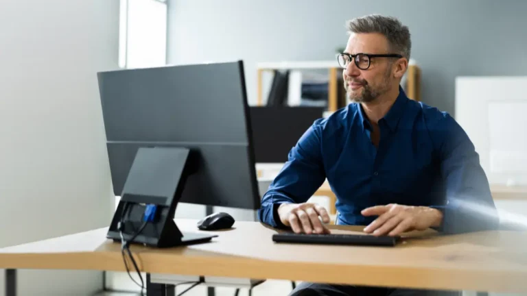 Business owner using a desktop computer.