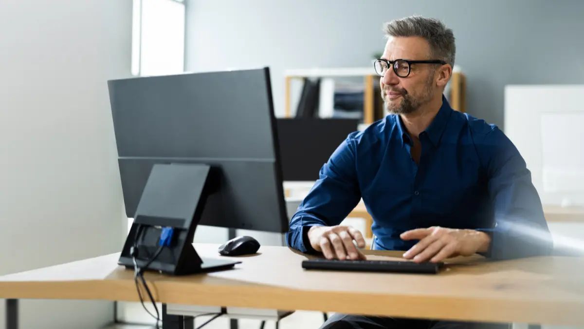 Business owner using a desktop computer.