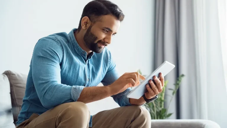 Employer accessing cloud-based payroll from home.